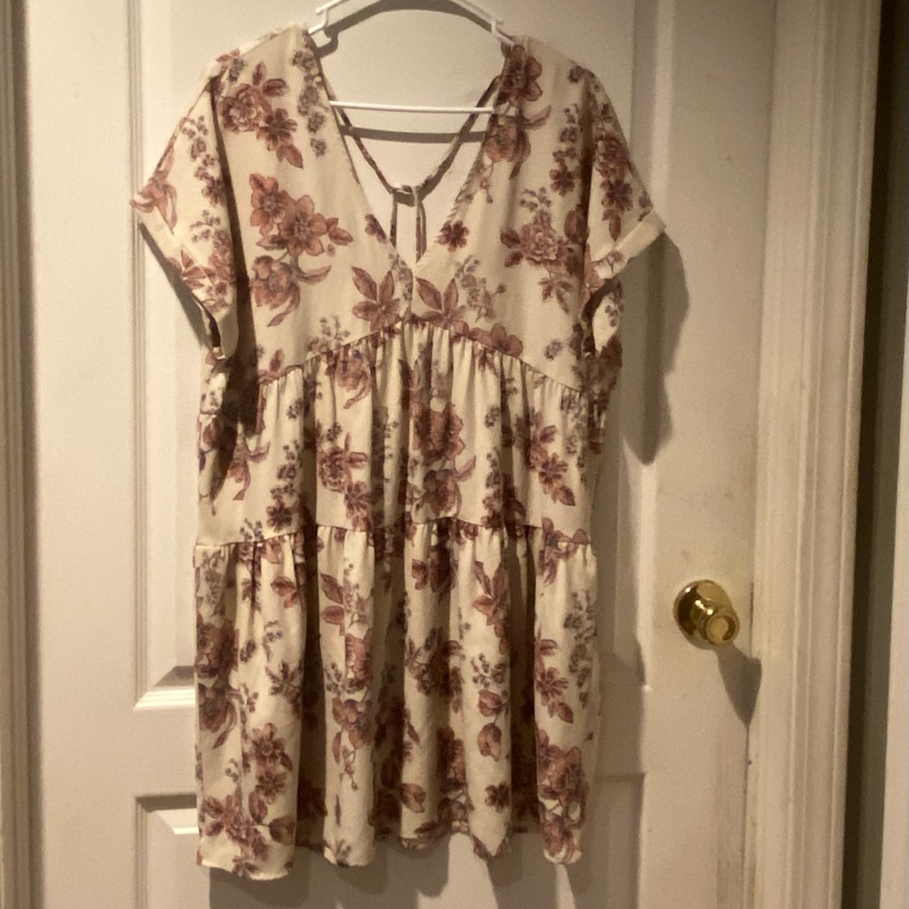 Cream and pink floral brunch dress with a V neck and tie in the back